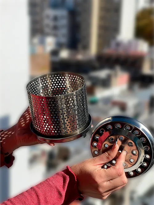 Contenedor para el carbón. Placa de encendido